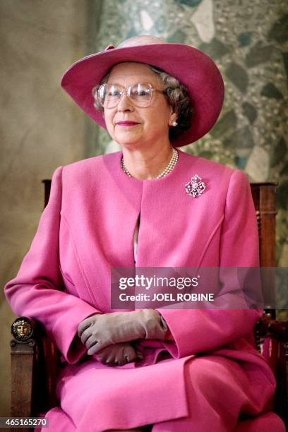 Portrait taken on June 11, 1992 in the city hall of Blois shows Britain's Queen Elizabeth II smiling during her third official visit in France. AFP...