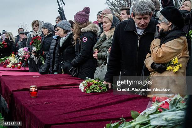 People look on near the grave of Russian opposition leader Boris Nemtsov at Troyekurovskoye Cemetary on March 3, 2015 in Moscow, Russia. Nemtsov was...