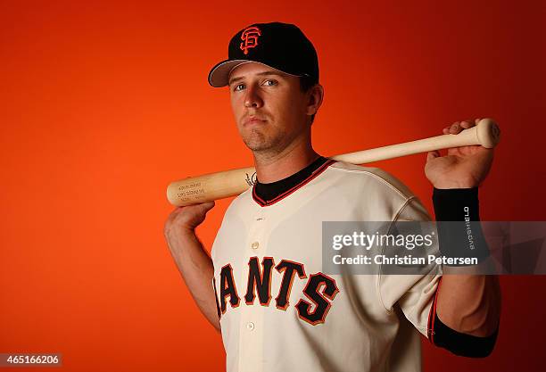 Buster Posey of the San Francisco Giants poses for a portrait during spring training photo day at Scottsdale Stadium on February 27, 2015 in...