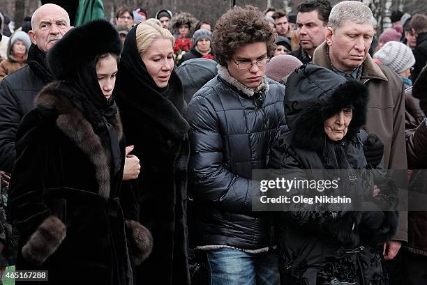 Dina Nemtsova, Ekaterina Odintsova, Anton Nemtsov Dina Eidman, 87 near the grave of opposition leader Boris Nemtsov during his funeral at...