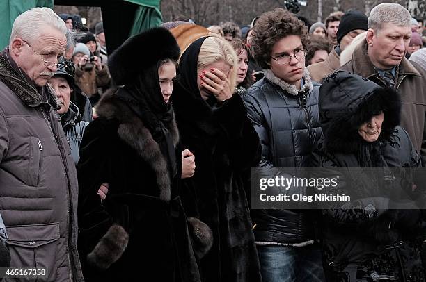 Dina Nemtsova, Ekaterina Odintsova, Anton Nemtsov Dina Eidman, 87 near the grave of opposition leader Boris Nemtsov during his funeral at...