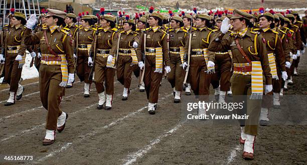 Contingent of Indian female police takes salute at the Bakshi stadium , where the authorities hold the main function during India's Republic Day...