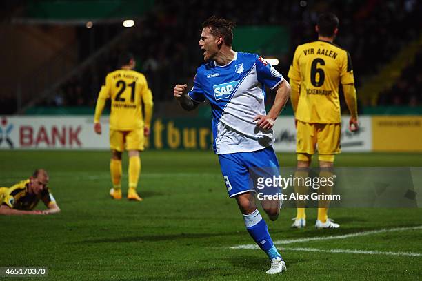 Eugen Polanski of Hoffenheim celebrates his team's first goal during the DFB Cup Round of 16 match between VfR Aalen and 1899 Hoffenheim at Scholz...