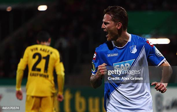 Eugen Polanski of Hoffenheim celebrates his team's first goal during the DFB Cup Round of 16 match between VfR Aalen and 1899 Hoffenheim at Scholz...