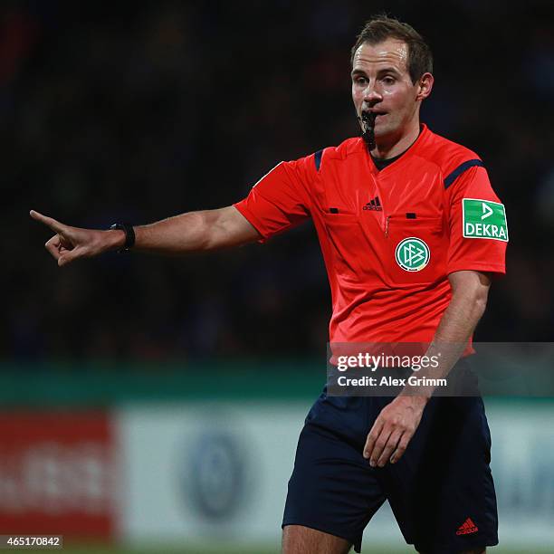 Referee Sascha Stegemann reacts during the DFB Cup Round of 16 match between VfR Aalen and 1899 Hoffenheim at Scholz Arena on March 3, 2015 in Aalen,...