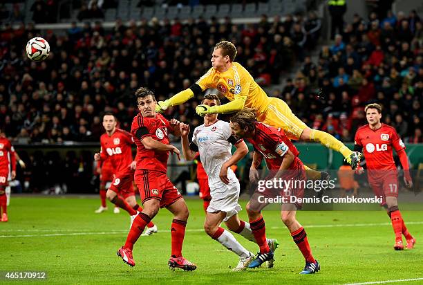 Bernd Leno , goalkeeper of Leverkusen makes a save during the round of 16 DFB Cup match between Bayer 04 Leverkusen and 1. FC Kaiserlautern at...