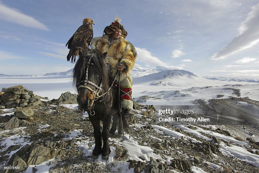 Epic Golden Eagle hunter on horseback