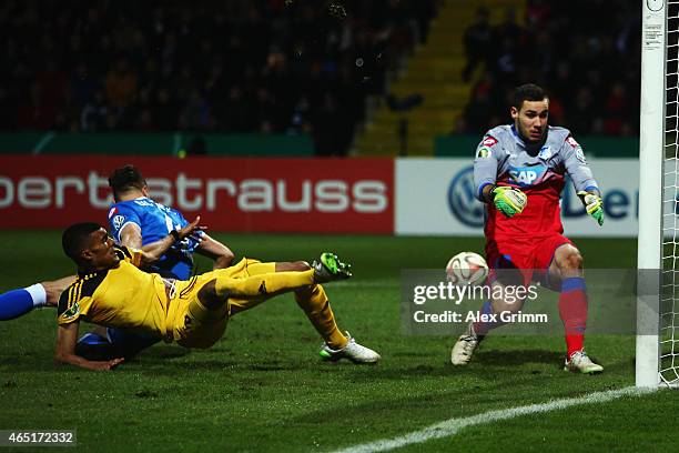 Goalkeeper Jens Grahl of Hoffenheim makes a save against Collin Quaner of Aalen during the DFB Cup Round of 16 match between VfR Aalen and 1899...