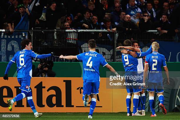 Kevin Volland of Hoffenheim celebrates his team's second goal with team mates during the DFB Cup Round of 16 match between VfR Aalen and 1899...