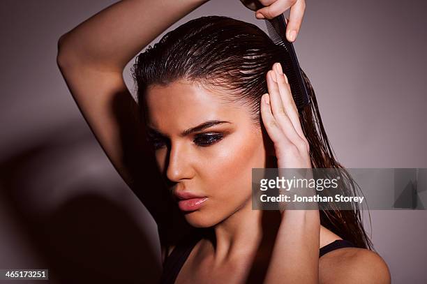 female beauty - hands on head stock pictures, royalty-free photos & images