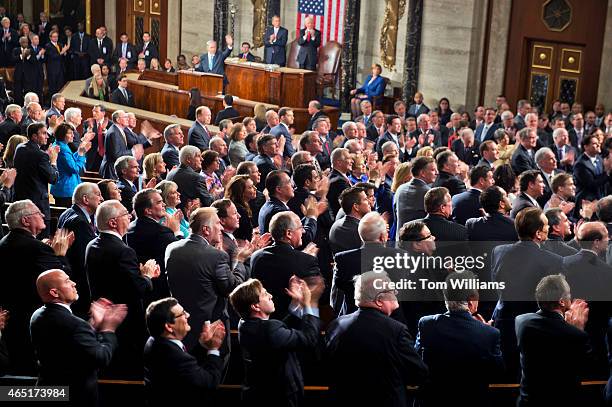 Members of Congress applaud for Holocaust survivor Elie Wiesel during Israeli Prime Minister Benjamin Netanyahu's address to a joint meeting of...