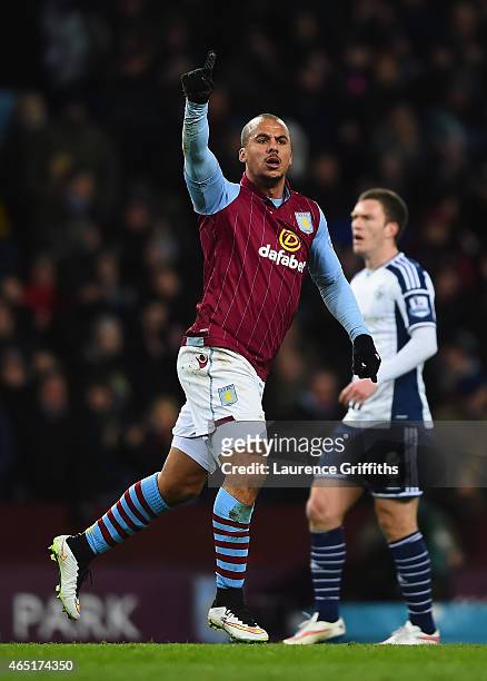 Gabriel Agbonlahor of Aston Villa celebrates scoring the opening goal during the Barclays Premier League match between Aston Villa and West Bromwich...