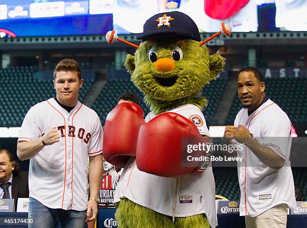 Canelo Alvarez, Houston Astros mascot Orbit and James Kirkland pose during a press conference for the May 9th fight between Alvarez and Kirkland at...