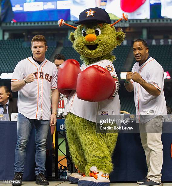 Canelo Alvarez, Houston Astros mascot Orbit and James Kirkland pose during a press conference for the May 9th fight between Alvarez and Kirkland at...