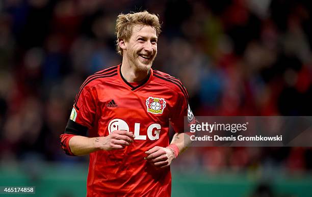 Stefan Kiessling of Leverkusen celebrates after he scores his team's opening goal during extra time during the round of 16 DFB Cup match between...