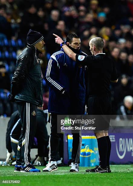 Referee Mike Dean sends Sunderland manager Gus Poyet to the stand during the Barclays Premier League match between Hull City and Sunderland at KC...