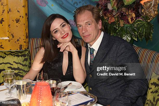 Belcim Bilgin and Julian Sands attend the premiere of "A Postcard From Istanbul" directed by John Malkovich in collaboration with St. Regis Hotels &...