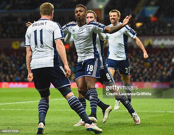 Saido Berahino of West Brom celebrates scoring their first goal with Chris Brunt and Craig Gardner of West Brom during the Barclays Premier League...