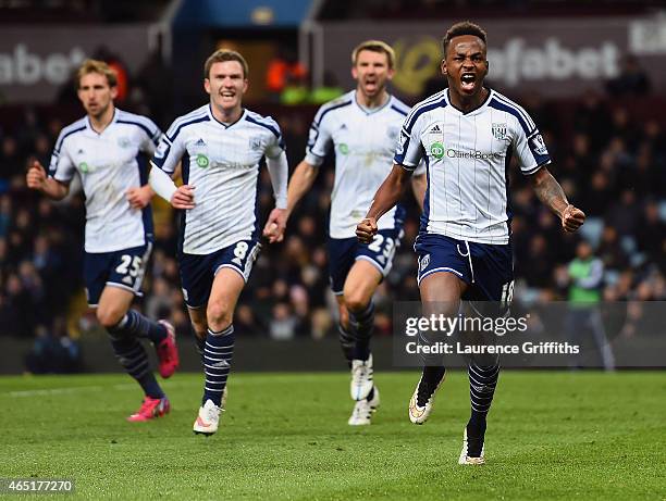 Saido Berahino of West Brom celebrates scoring their first goal during the Barclays Premier League match between Aston Villa and West Bromwich Albion...