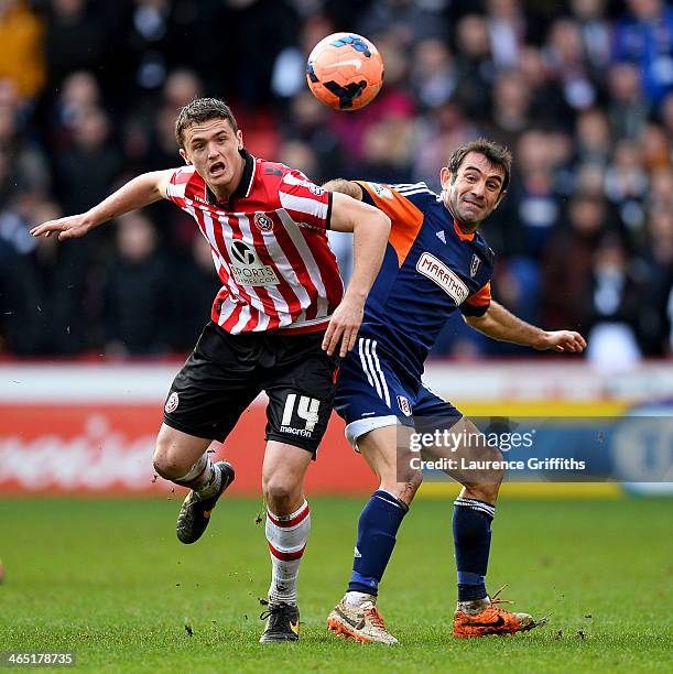 Giorgos Karagounis of Fulham battles with Stephen McGinn of Sheffield United during the FA Cup with Budweiser fourth round match between Sheffield...