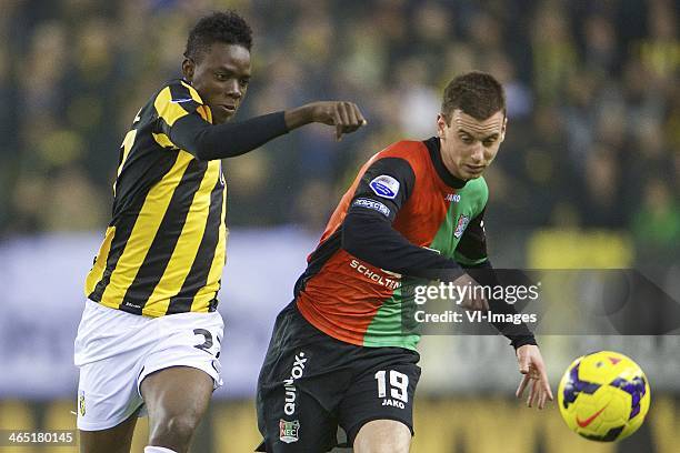 Bertrand Traore of Vitesse, Marnick Vermijl of NEC Nijmegen during the Dutch Eredivisie match between Vitesse Arnhem and NEC Nijmegen at Gelredome on...