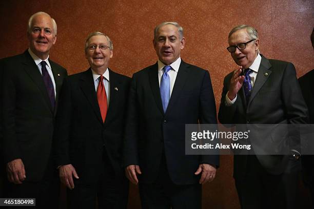 Israeli Prime Minister Benjamin Netanyahu poses for photographers with U.S. Senate Majority Leader Sen. Mitch McConnell , Senate Minority Leader Sen....