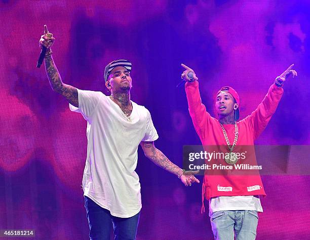 Chris Brown and Tyga perform at Phillips Arena on March 2, 2015 in Atlanta, Georgia.