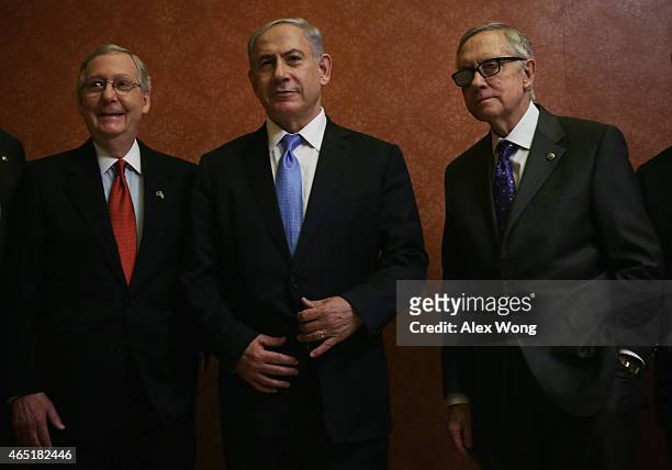 Israeli Prime Minister Benjamin Netanyahu poses with U.S. Senate Majority Leader Mitch McConnell and Senate Minority Leader Harry Reid prior to a...