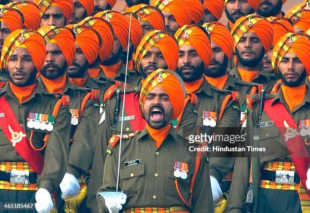 Sikh Light Infantry regiment jawans of Indian Army marching during the 65th Republic Day parade at Rajpath on January 26, 2014 in New Delhi, India....