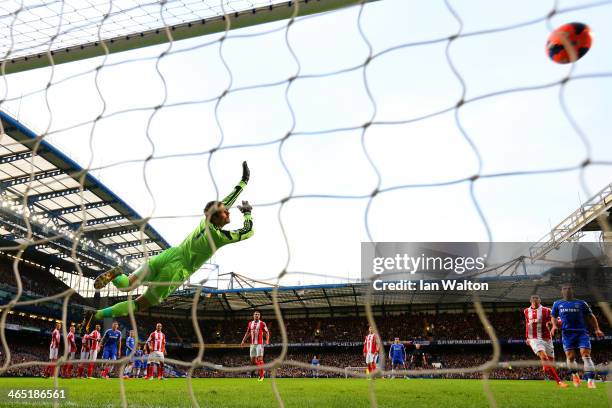 Asmir Begovic of Stoke City fails to stop Oscar of Chelsea score the opening goal from a free kick during the FA Cup Fourth Round between Chelsea and...
