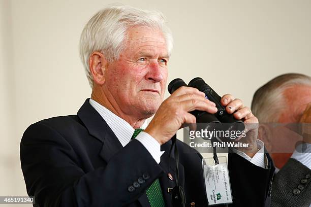 Sir Patrick Hogan watches the racing during Auckland Cup Day at Ellerslie Racecourse on March 4, 2015 in Auckland, New Zealand.