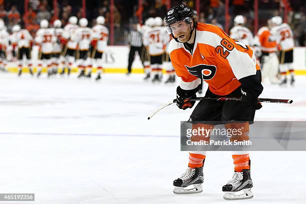 Claude Giroux of the Philadelphia Flyers reacts after Jiri Hudler of the Calgary Flames scored the game-winning goal in overtime at Wells Fargo...