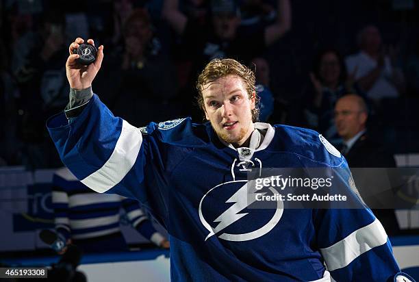 Goalie Andrei Vasilevskiy of the Tampa Bay Lightning thanks fans for their support after being name the first star of the game against the Buffalo...