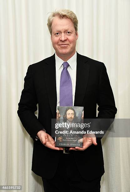 Lord Charles Spencer poses with a copy of his book "Killers of the King : The Men Who Dared to Execute Charles I" at the British American Business...