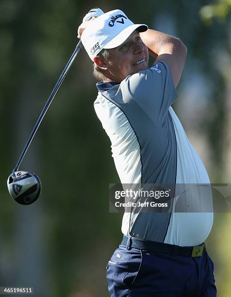 Freddie Jacobson of Sweden hits a tee shot on the 2nd hole on the Arnold Palmer Private Course at PGA West during the Humana Challenge in partnership...