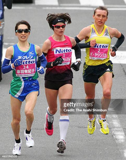 Yukiko Akaba of Japan, Tetiana Gamera-Shmyrko of Ukraine and Karolina Jarzynska of Poland compete during the 33rd Osaka Women's Marathon on January...