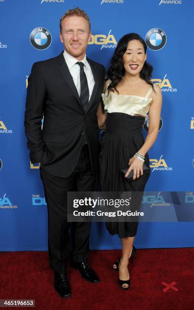 Actors Kevin McKidd and Sandra Oh arrive at the 66th Annual Directors Guild Of America Awards at the Hyatt Regency Century Plaza on January 25, 2014...