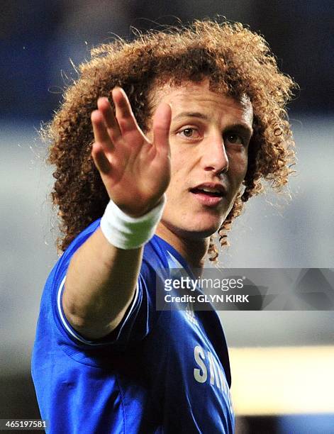 Chelsea's Brazilian defender David Luiz waves to the fans after Chelsea won the English FA Cup fourth round football match between Chelsea and Stoke...