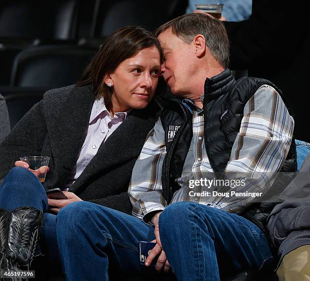 Governor of Colorado John Hickenlooper and his girlfriend Robin Pringle attend the Denver Nuggets game against the Milwaukee Bucks at Pepsi Center on...