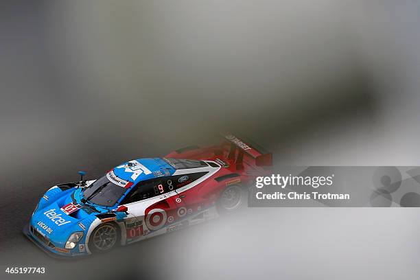 The Chip Ganassi Racing Telcel/Target Riley DP driven by Scott Pruett, Memo Rojas, Jamie McMurray and Sage Karem races during the Rolex 24 at Daytona...