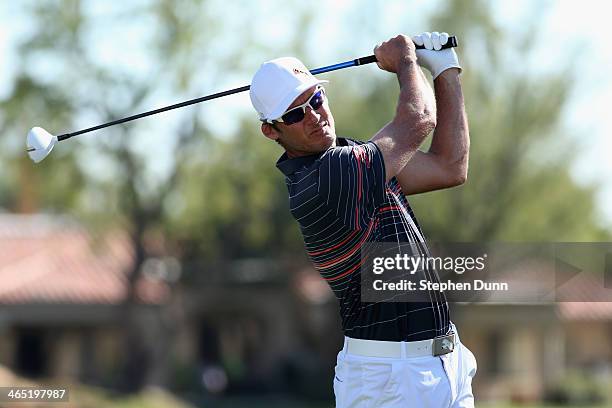 Will MacKenzie hits a tee shot on the first hole on theJack Nicklaus Private Course at PGA West during the first round of the Humana Challenge in...