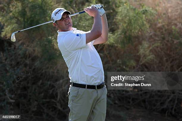 Jason Kokrak hits a tee shot on the 17th hole on theJack Nicklaus Private Course at PGA West during the first round of the Humana Challenge in...