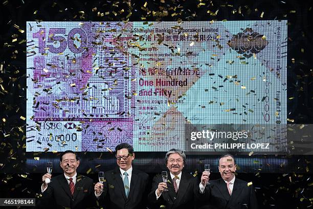 Group CEO Stuart Gulliver along with HSBC Asia-Pacific CEO Peter Wong, Hong Kong Monetary Authority chief executive Norman Chan and Hong Kong...