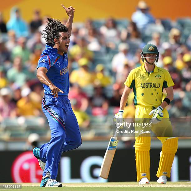 Shahpur Zadran of Afghanistan appeals unsuccessfully for the wicket of David Warner of Australia during the 2015 ICC Cricket World match between...