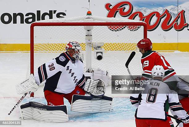 Travis Zajac of the New Jersey Devils scores a first period goal against the New York Rangers during the 2014 Coors Light NHL Stadium Series at...