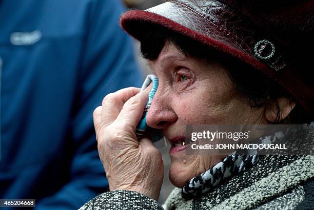 Valentina Dzuba mother of a miner, cries outside the Zasyadko mine in Donetsk after the mine was rocked by an explosion on March 4, 2015. At least 32...