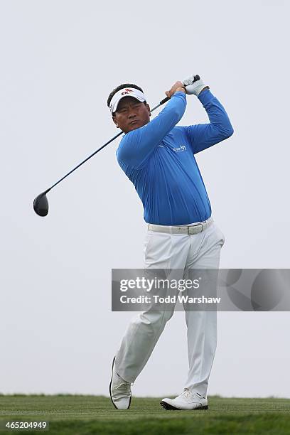 Choi hits a tee shot on the 4th hole during the final round of the Farmers Insurance Open on Torrey Pines South on January 26, 2014 in La Jolla,...
