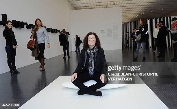 French artist Tania Mouraud sits on "Initiation space n°5", 2013-2015 on March 2, 2015 at the Pompidou Center-Metz in the eastern city of Metz, two...
