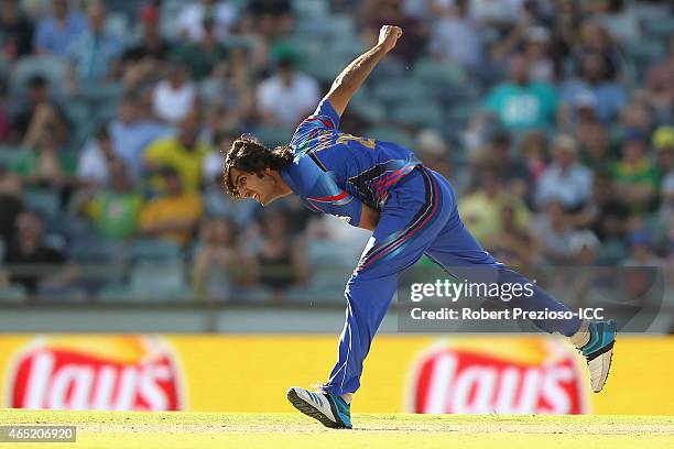 Shapoor Zadran of Afghanistan bowls during the 2015 ICC Cricket World match between Australia and Afghanistan at WACA on March 4, 2015 in Perth,...