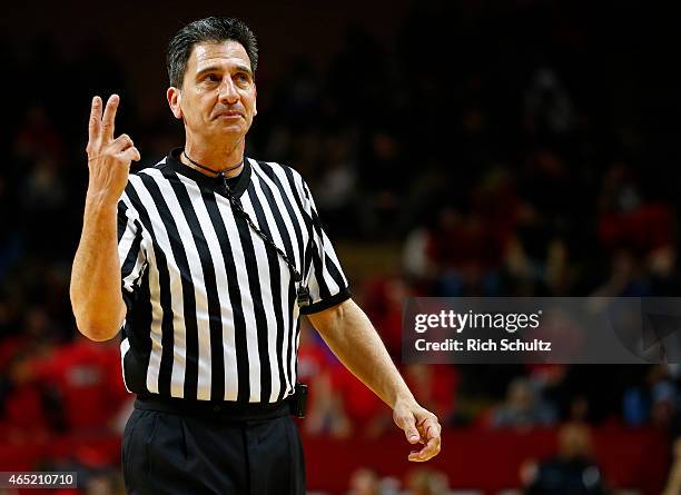 Referee Gene Steratore gestures during a college basketball game between the Maryland Terrapins and Rutgers Scarlet Knights at the Rutgers Athletic...